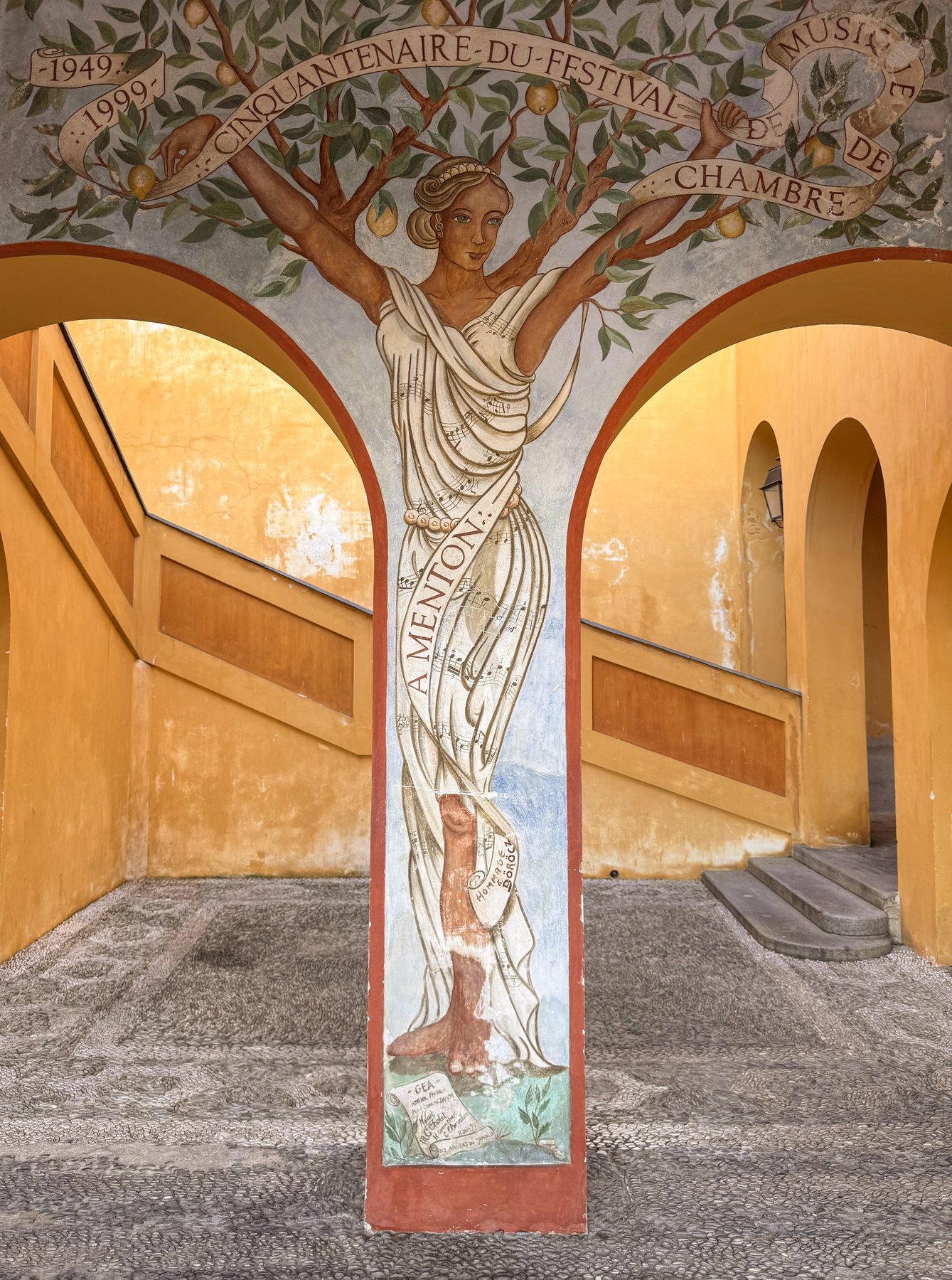 Painted fresco mural in an archway in Menton, France